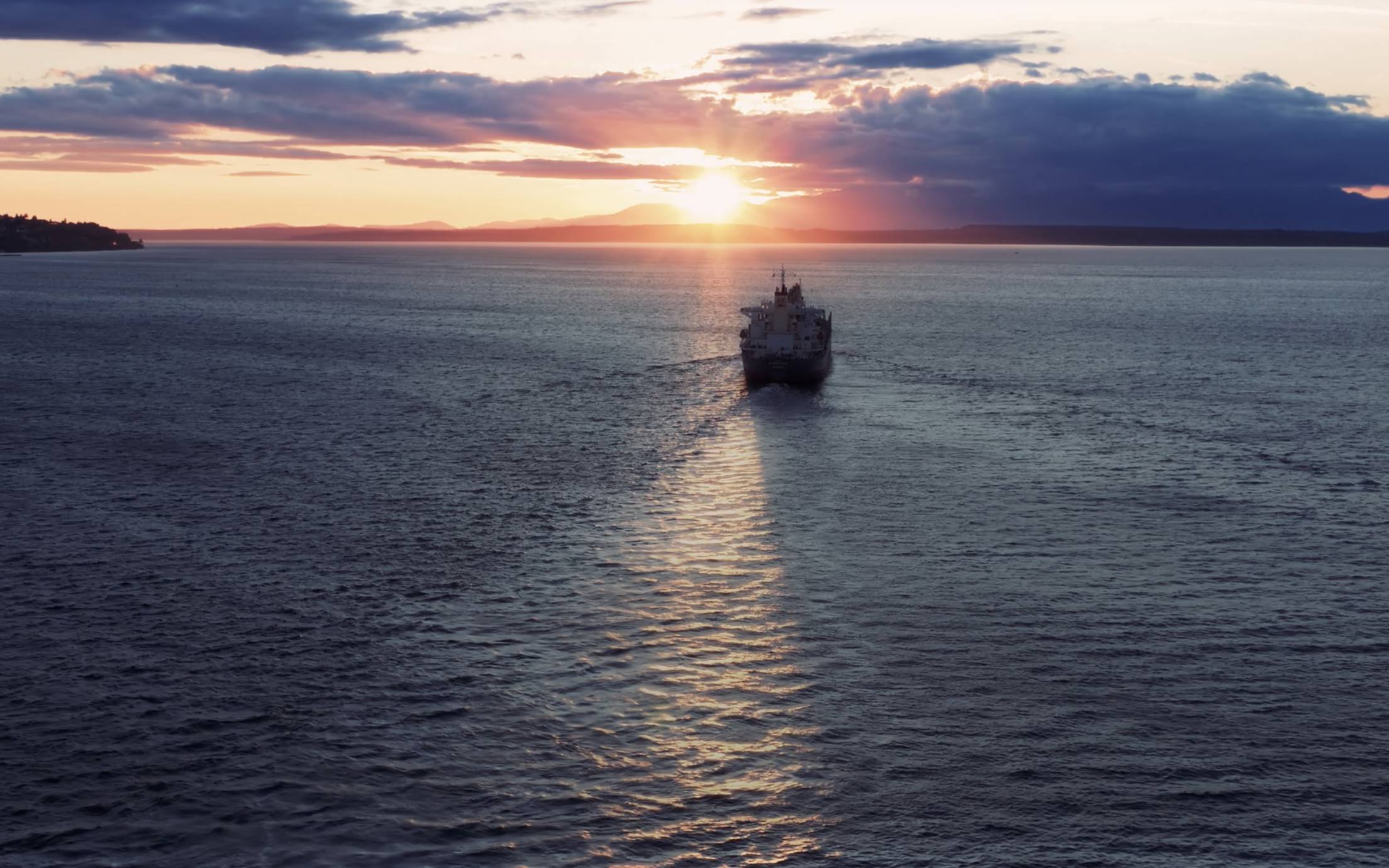 Vessel in the sea with sunset