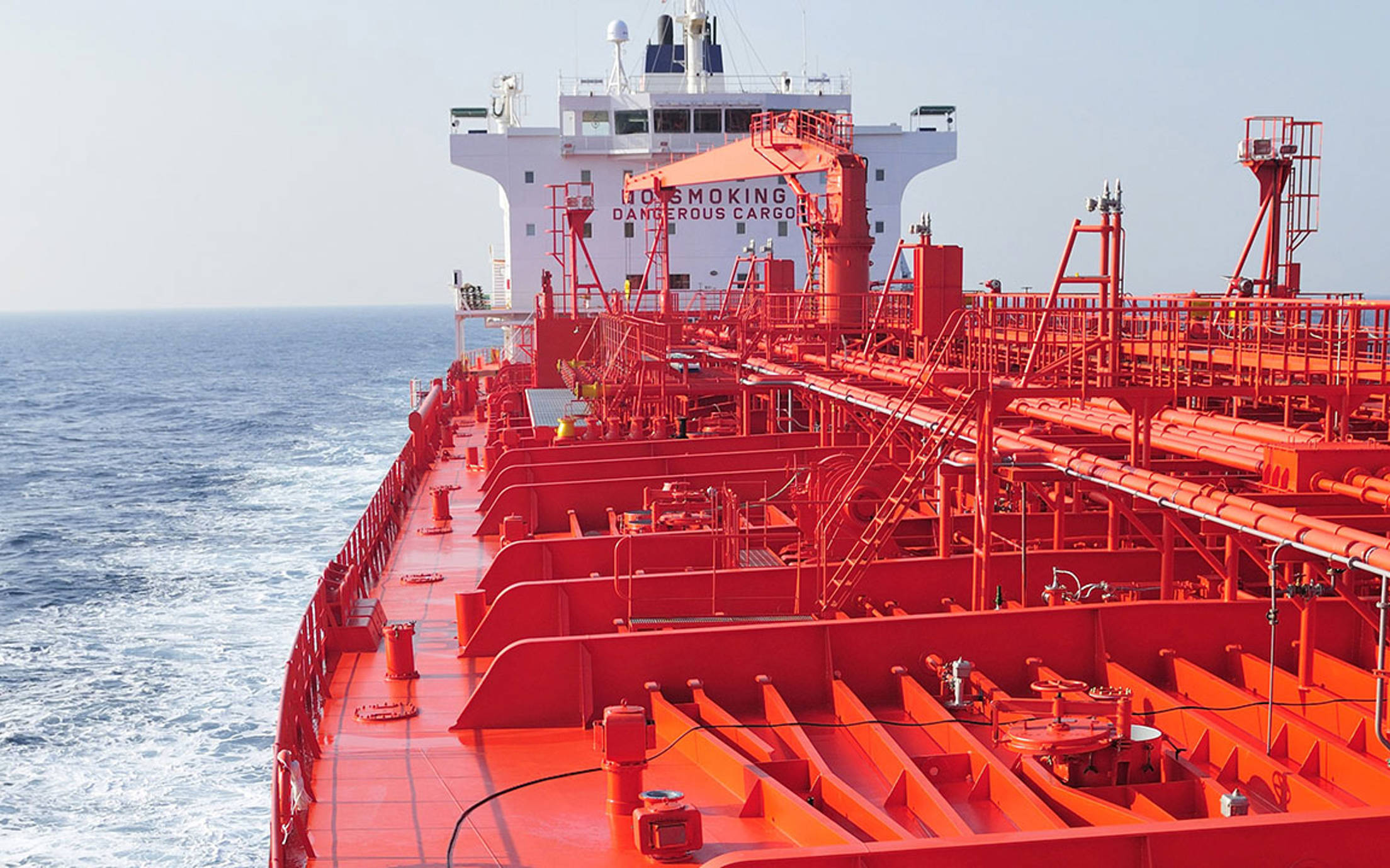 A red ship out on sea